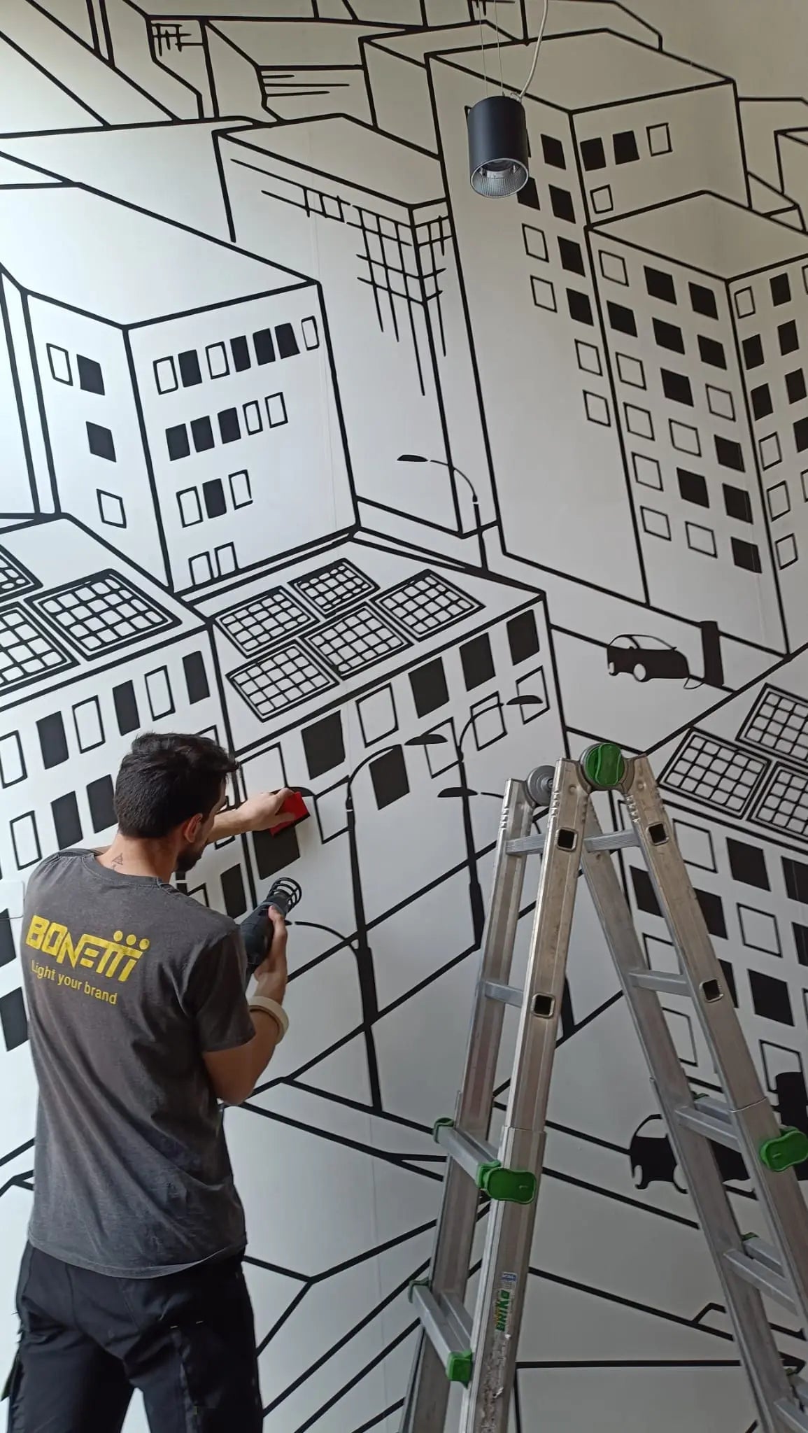 Applicazione vinile stampato in digitale su muro ufficio