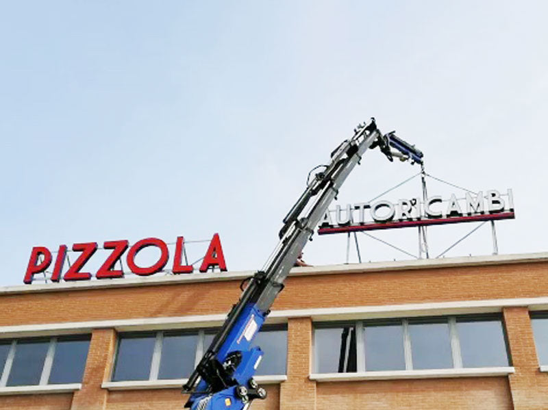 installazione insegna pizzola autoricambi fidenza