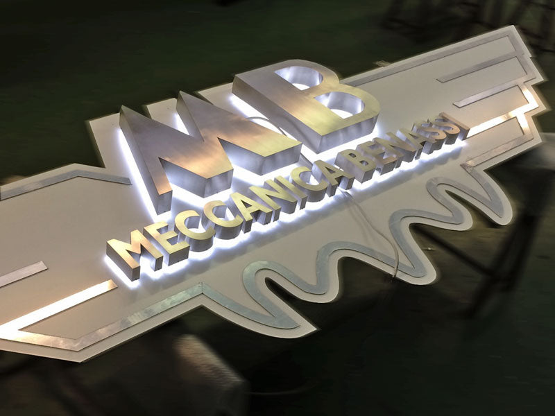 produzione insegna retroilluminata acciaio inox meccanica benassi ferrara